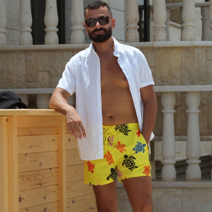 Yellow Swim Shorts with Turtle Designs Yellow Swim Shorts with Turtle Designs